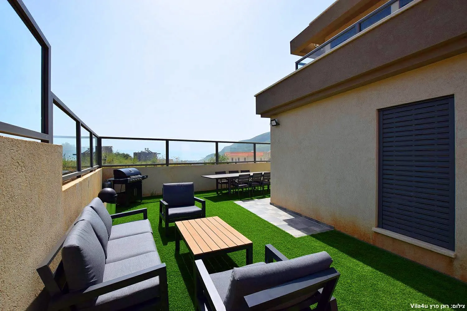 Kinneret House – outdoor lounge with mountain view